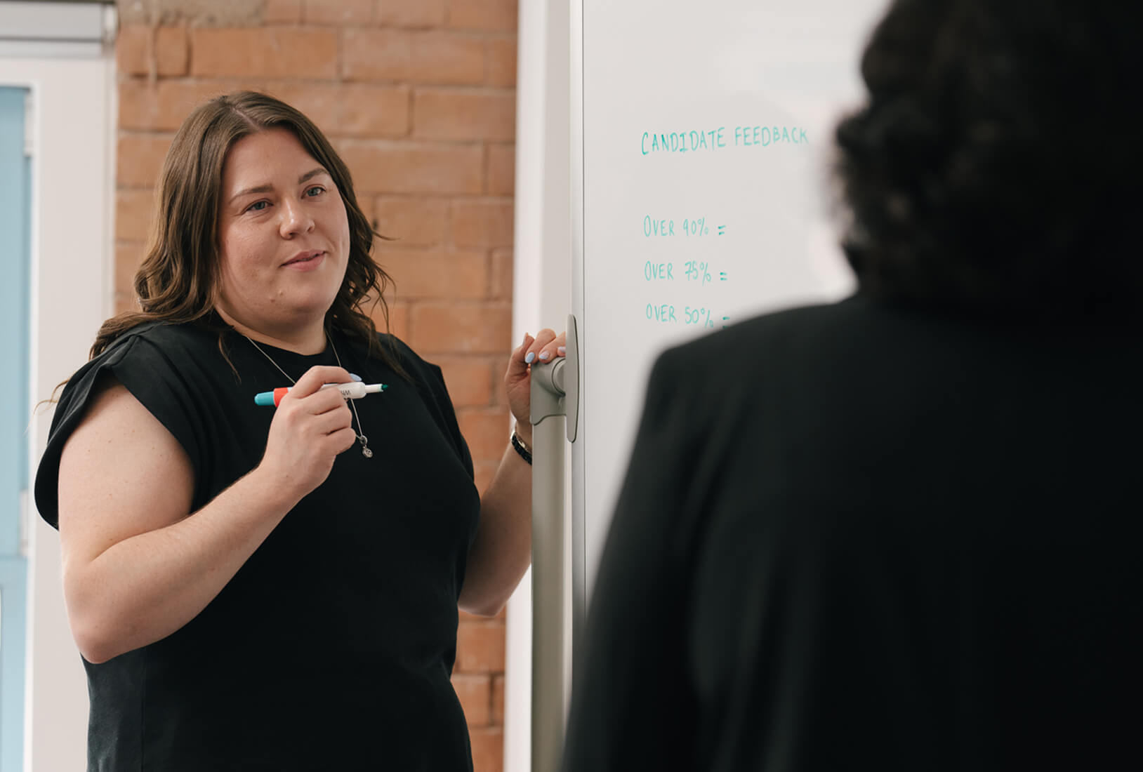 A Coralta support worker assisting a client
