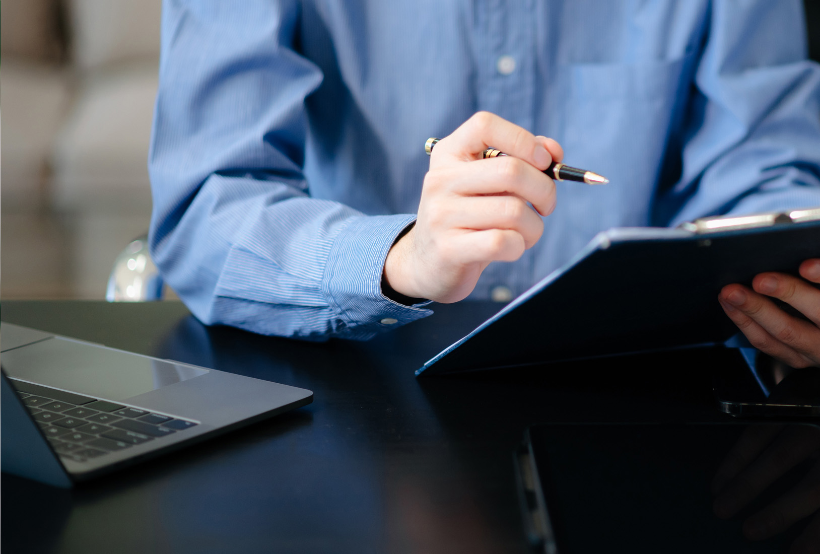 A Coralta support worker assisting a client