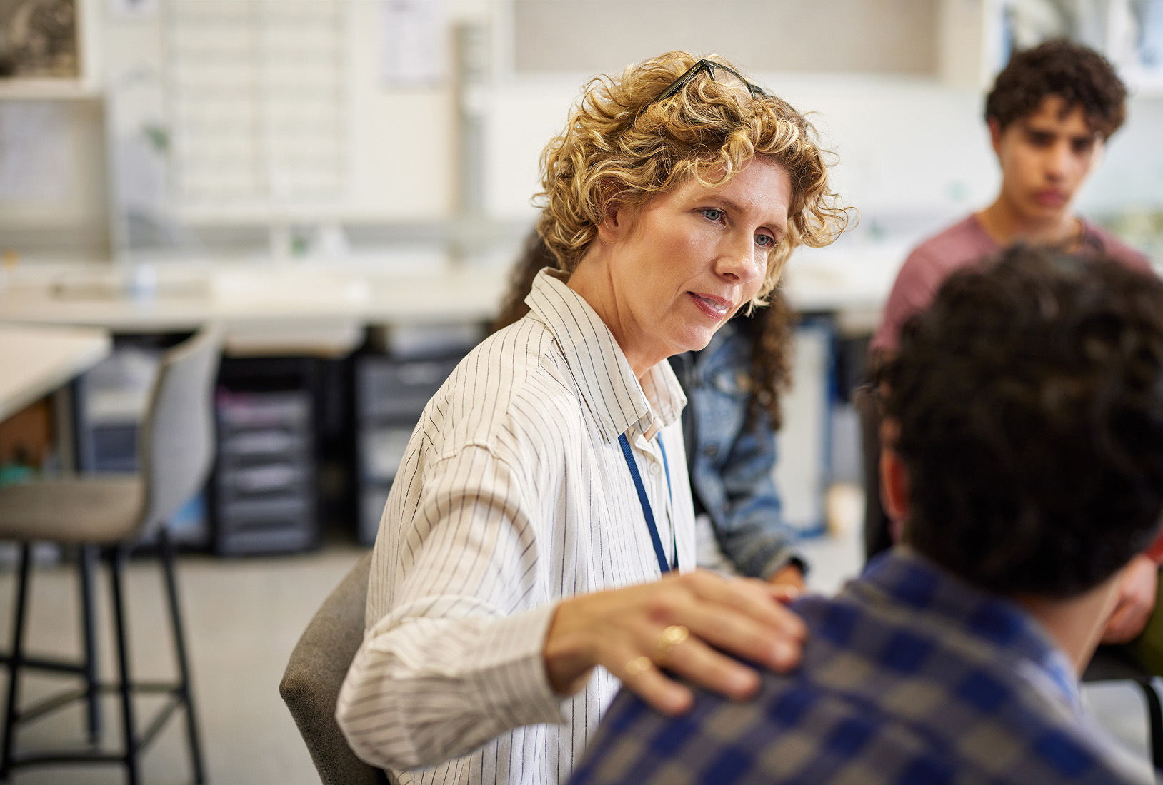 A Coralta support worker assisting a client